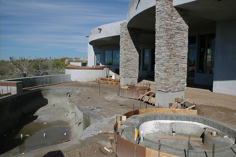 In the backyard they have started building the forms for the patio decks which will be acid-washed concrete.\n(January 2005)