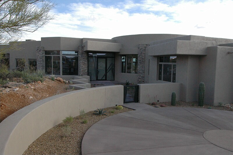 Outside the front courtyard, the entry gate is now in place.\n(March 2005)