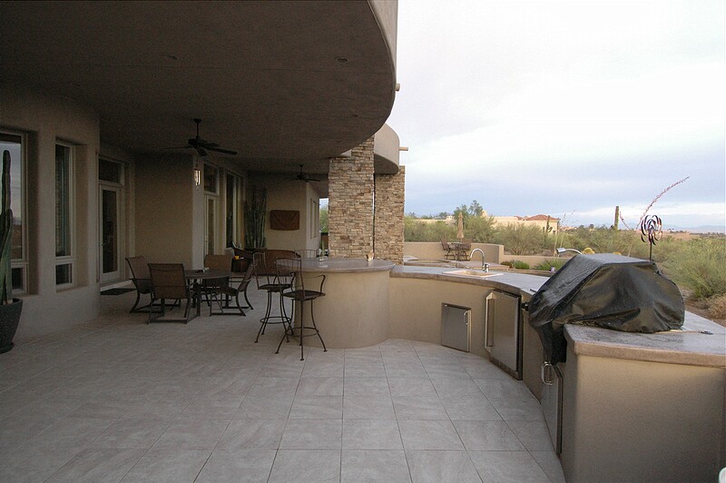 The rear patio and the outdoor kitchen