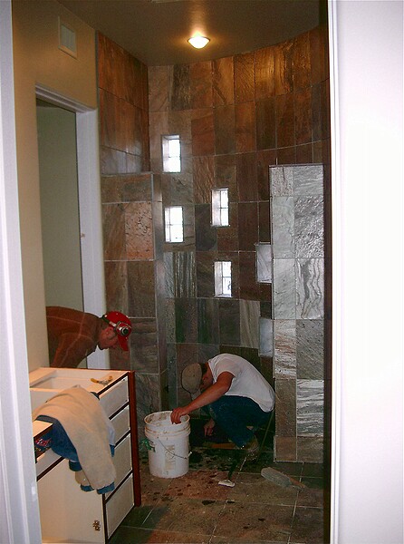 Installation of the slate tile in the guest bathroom.\n(January 2005)